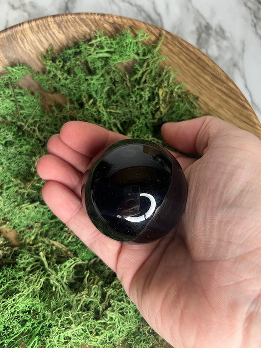 Black obsidian sphere ￼A