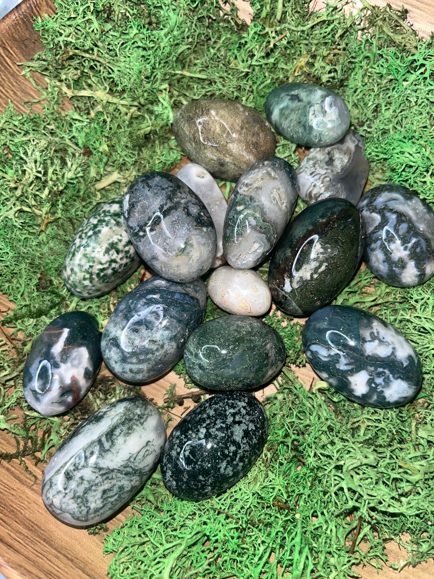 Moss, agate tumbles ￼