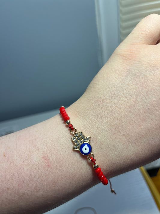 Red Humsa hand evil eye bracelet